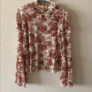 Sheer floral blouse with ruffle detailing